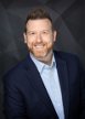 Professional headshot of Spencer Acadia